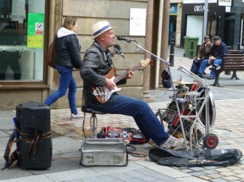 Busker in Academy Street, Inverness.