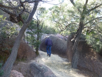 Path still going up, betwen granite boulders.