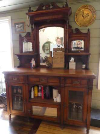Old Barbershop cabinet, you can get your hair cut there now.